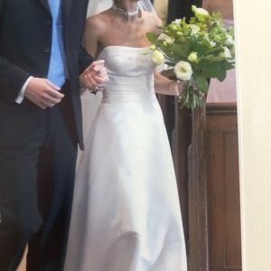 Pale cream satin wedding dress